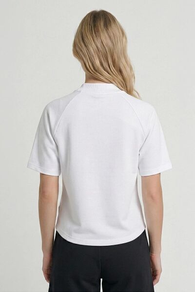 HUMMEL hmlT-TECH W T-SHIRT S/S KADIN T-SHIRT